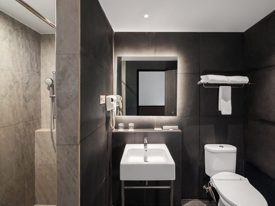 Shower, free toiletries, hair dryer, slippers