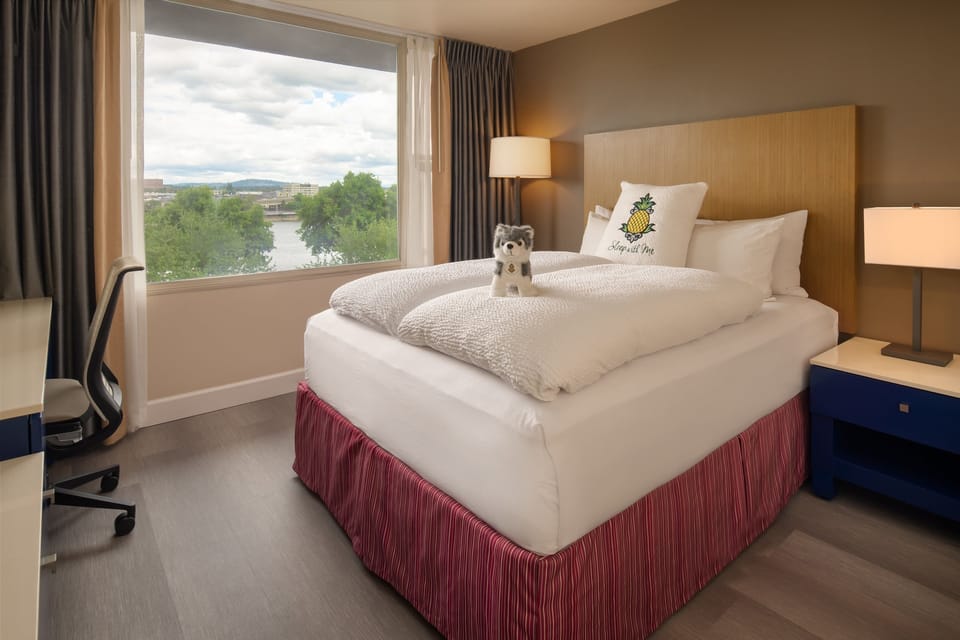 Premium bedding, down comforters, pillowtop beds, in-room safe
