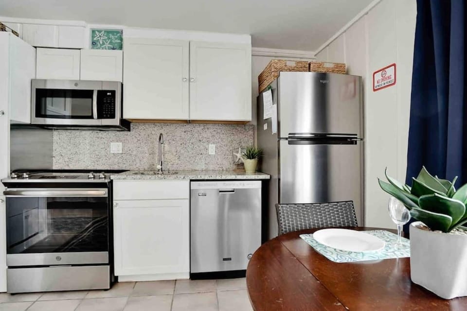 All new stainless steel appliances and attractive granite countertops delight guests.  You can watch for dolphins as you grab a bite to eat!