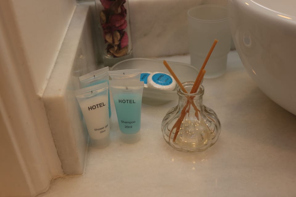 Triple Room | Bathroom amenities | Free toiletries, hair dryer, slippers, towels