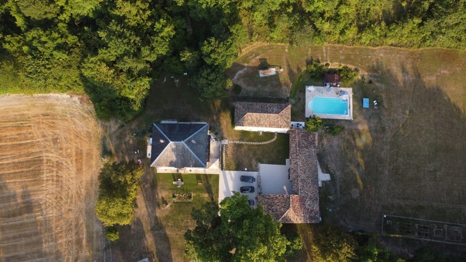 A drone shot of the whole property. The gite and pool are on the right hand side