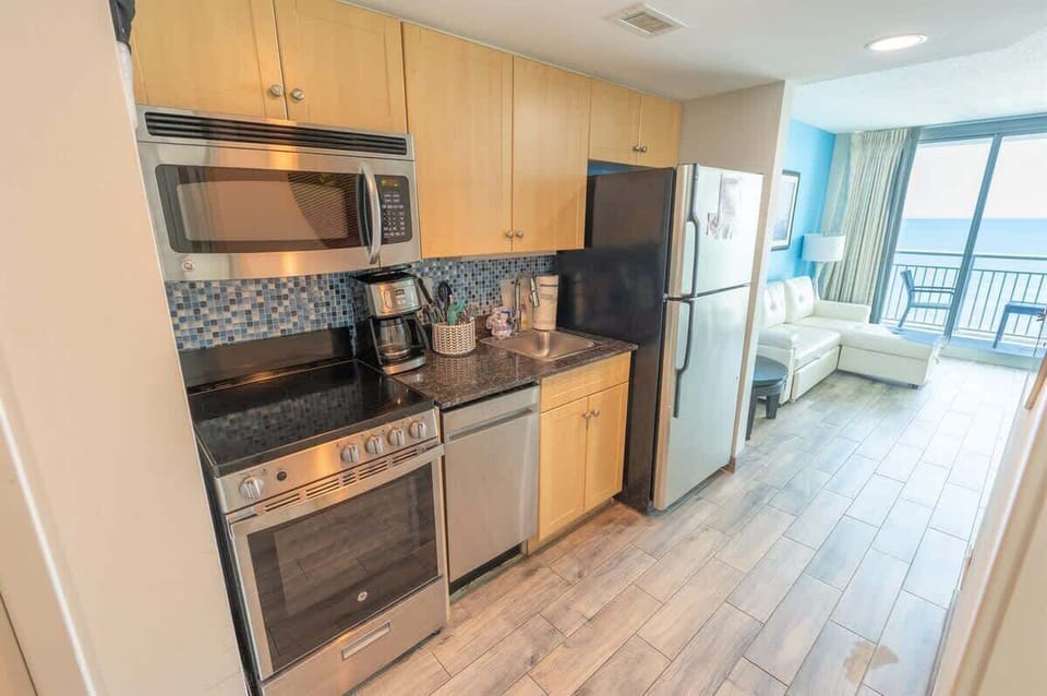 Full Sized Modern Appliances in Kitchen Area