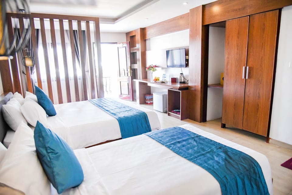 Family Room | Minibar, in-room safe, blackout drapes, soundproofing