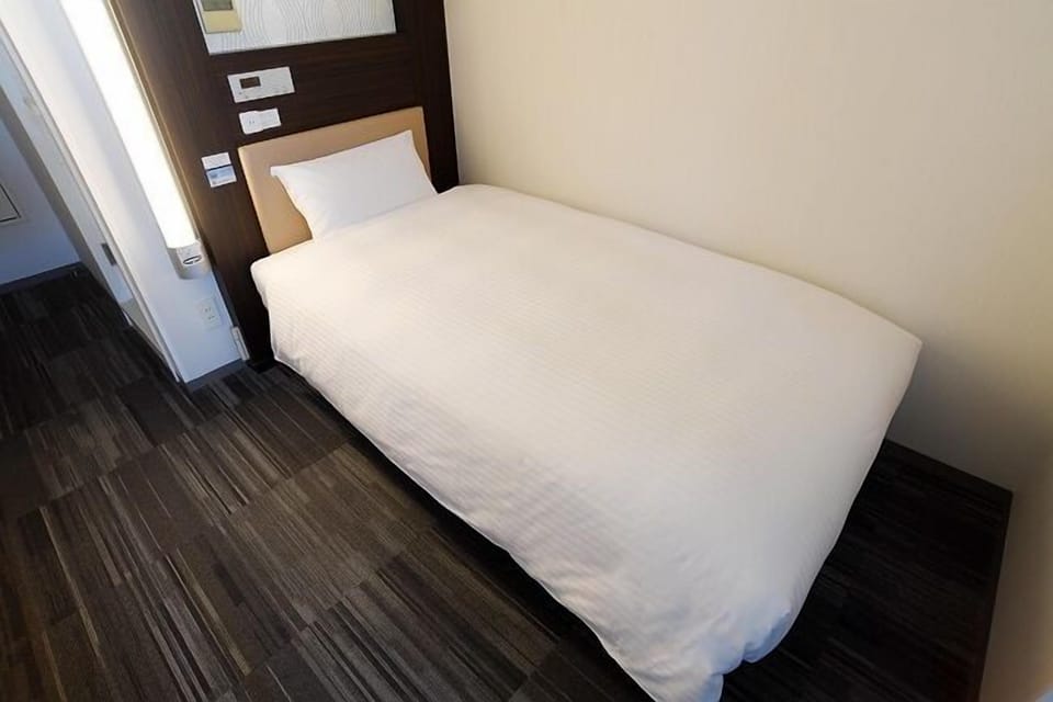 Down comforters, free wired internet, bed sheets