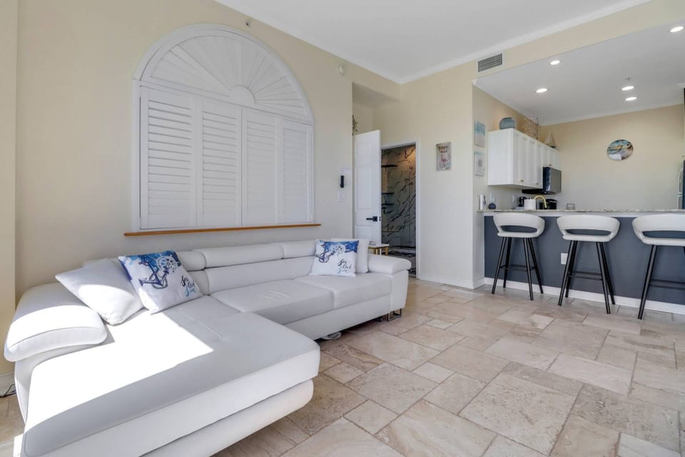 Relaxing on the sofa, which opens to a Full XL bed, allowing for up to 2 additional guests.