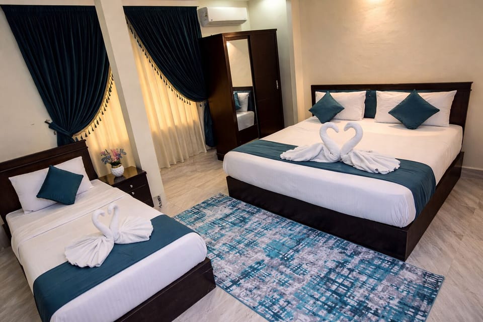 Deluxe Triple Room | Egyptian cotton sheets, premium bedding, down comforters