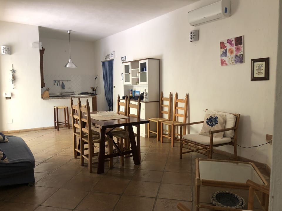 Family Villa, Partial Sea View | Living area | TV