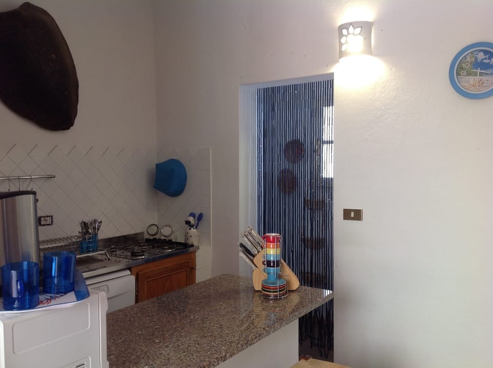 Family Villa, Partial Sea View | Private kitchen | Coffee/tea maker