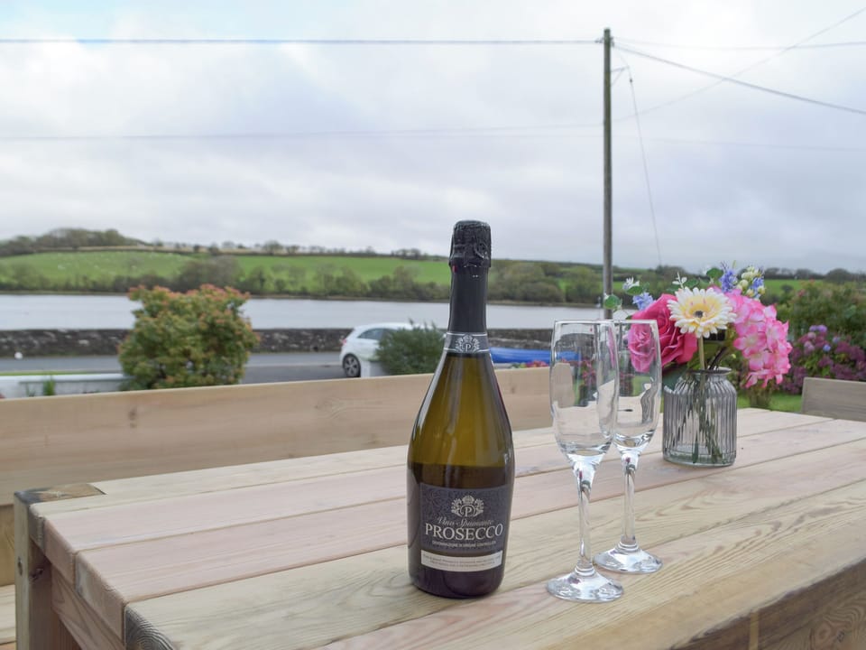 Outdoor seating area on the patio | Green Acre, St Dogmaels, near Cardigan
