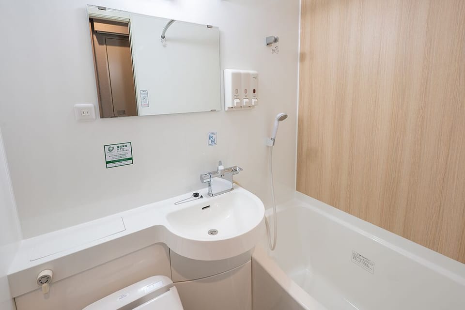 Single Room, Non Smoking | Bathroom | Combined shower/tub, hair dryer, electronic bidet, towels