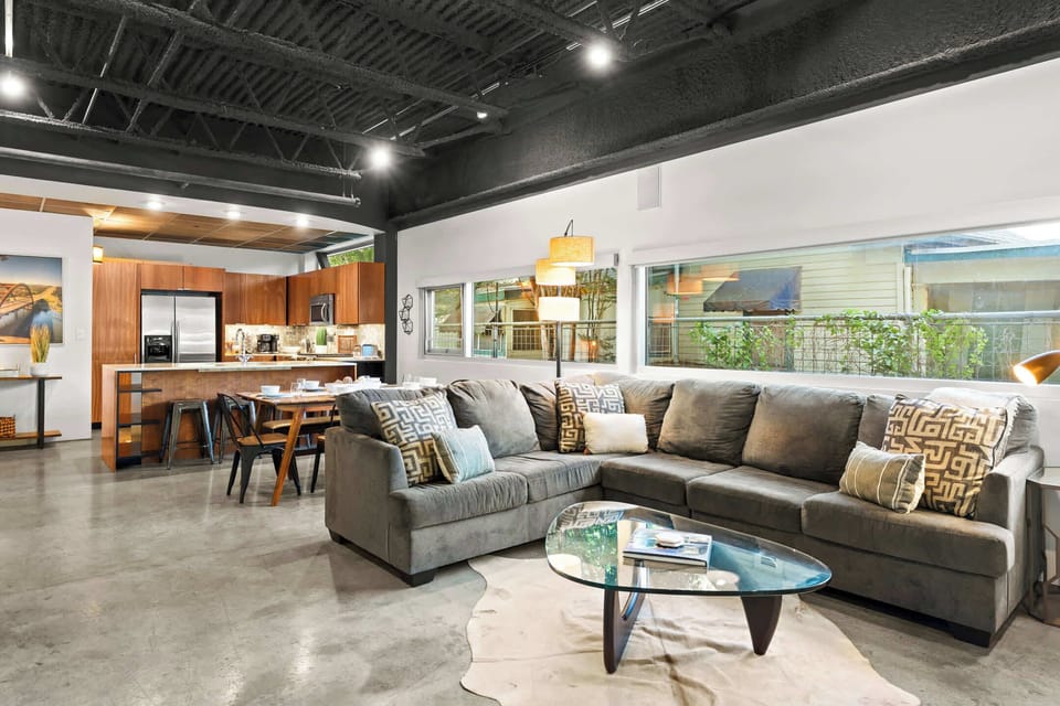 The living area opens to the dining table and kitchen, which makes it easy to entertain!