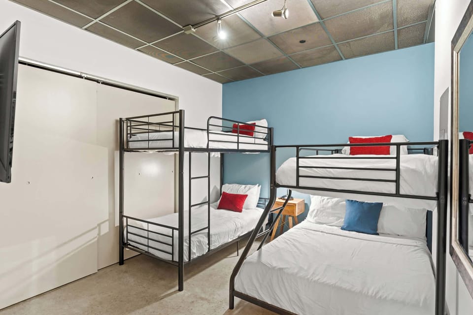 Bedroom 1 has a Twin over Double bunk bed and a Twin over Twin bunk bed which accommodates up to 5 total guests.