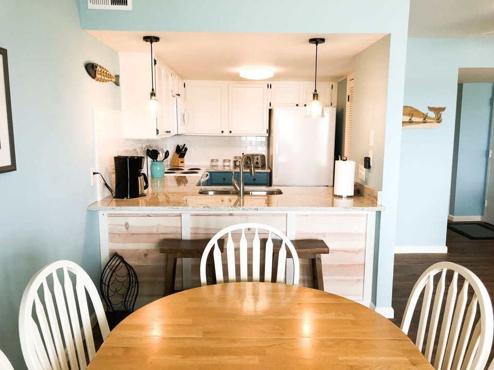 View of kitchen from dining