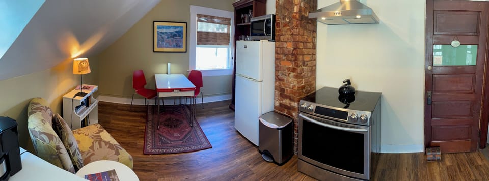 Full-size fridge, microwave, toaster, cleaning supplies