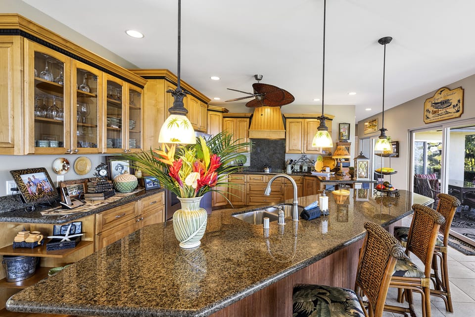 Gourmet custom kitchen makes meal preparation a breeze with high-end finishes and ample space.