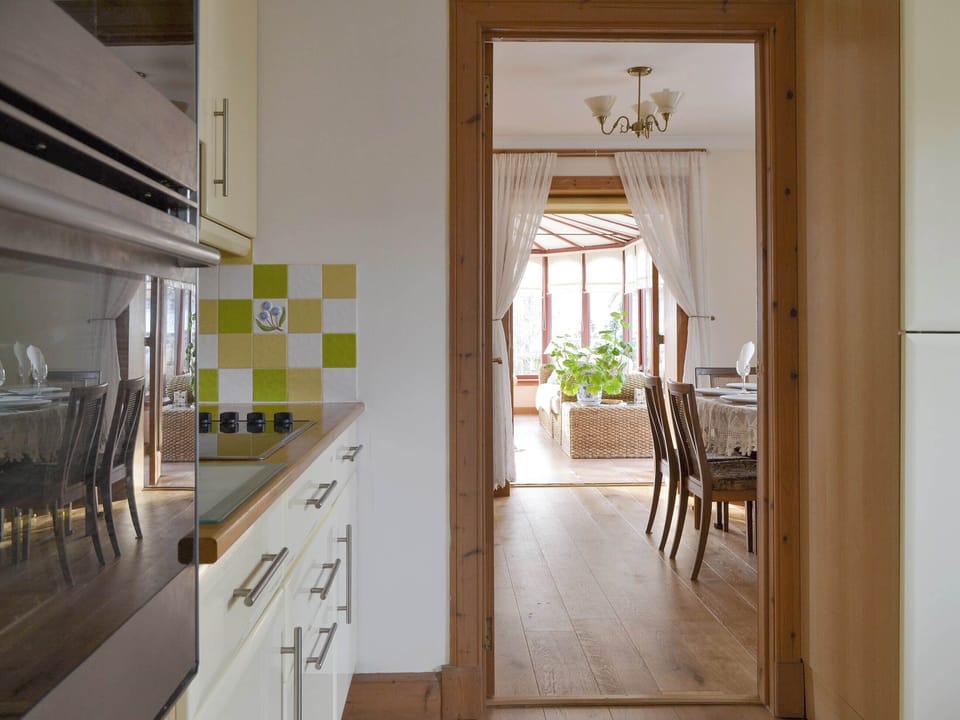 Well-equipped fitted kitchen | Rowan Cottage, Aviemore