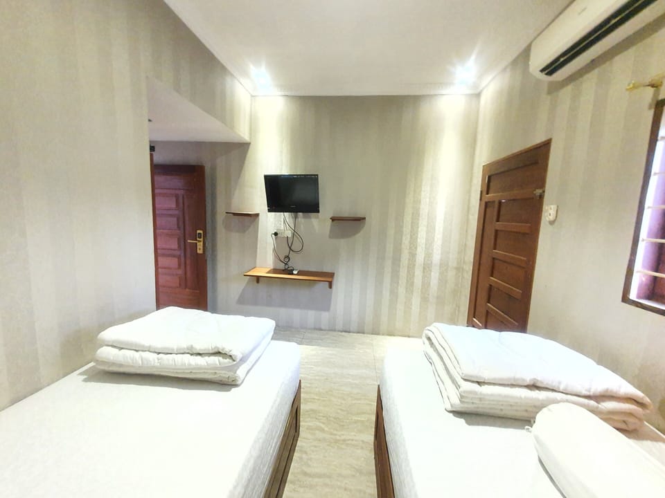 Standard Double or Twin Room | WiFi (free), bed sheets