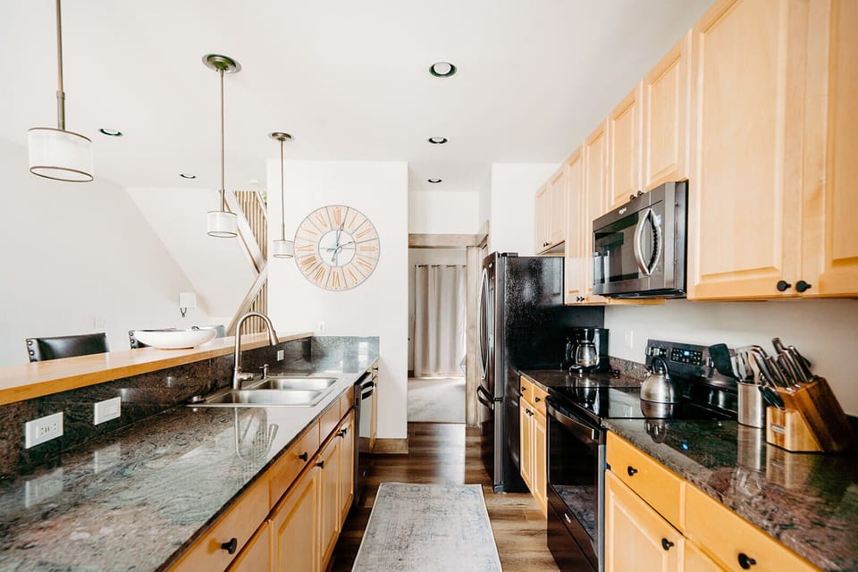 Well-stocked kitchen with crockpot, spices and more!