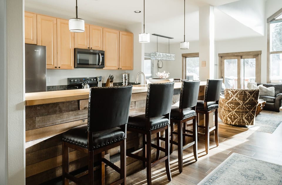 Sit at the bar-height counter and visit while dinner is being made