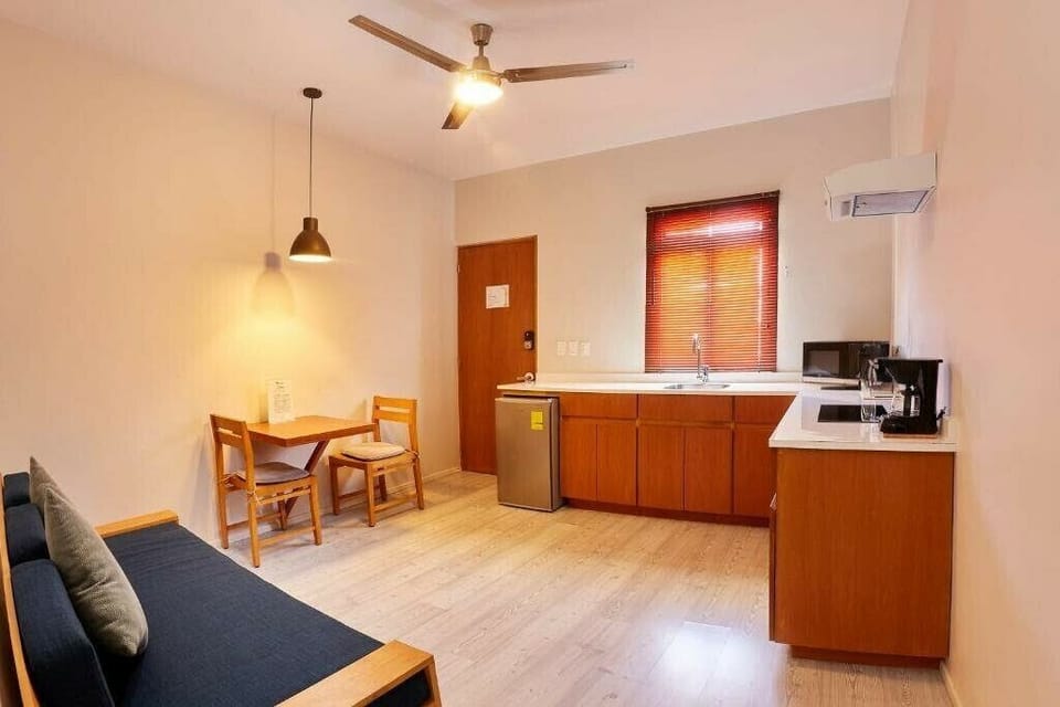 Master Bedroom, 1 Queen Bed | Private kitchen | Mini-fridge, microwave, stovetop, coffee/tea maker