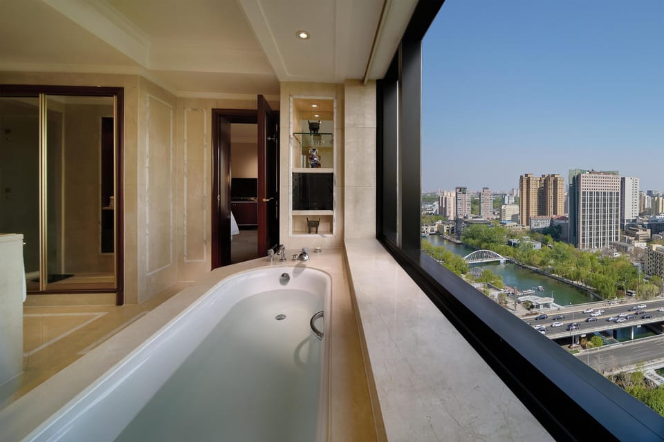Rainfall showerhead, designer toiletries, hair dryer, bathrobes