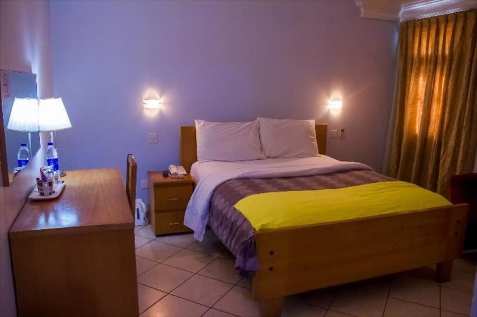 Desk, laptop workspace, free WiFi, bed sheets