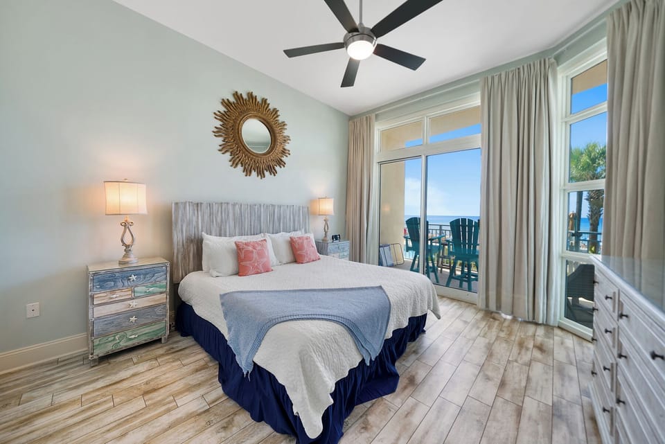 Wake up to ocean views from your coastal bedroom, where sea breezes flow through sliding doors to your private balcony.