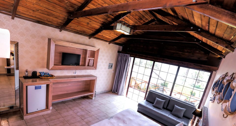Standard Bungalow, Sea View | Living area | 32-inch LED TV with satellite channels, TV