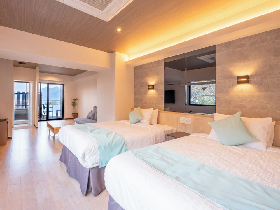 Modern Western style room with open-air bath Non-smoking | Premium bedding, down comforters, pillowtop beds, in-room safe