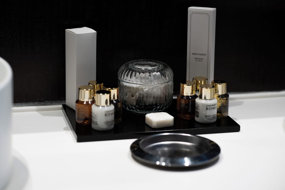 Deluxe Studio Suite | Bathroom | Designer toiletries, hair dryer, slippers, bidet