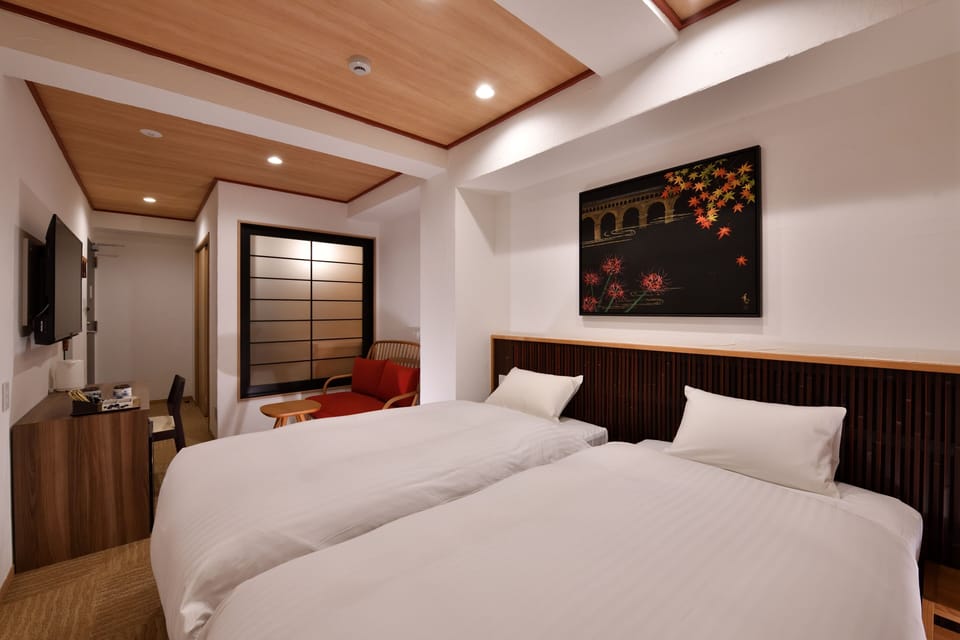 Deluxe Twin Room, Women only, Non Smoking | In-room safe, desk, blackout drapes, iron/ironing board