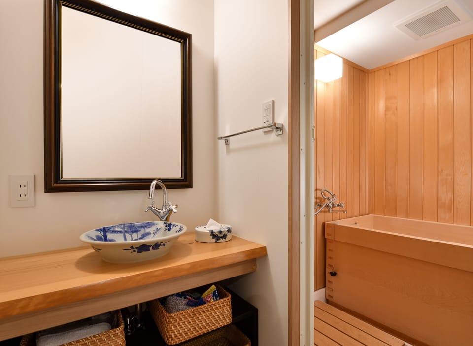 Executive Twin Room (Women or Couple Only) | Bathroom | Combined shower/tub, hair dryer, slippers, electronic bidet