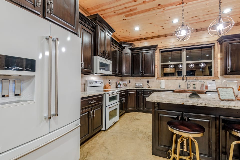 The large kitchen and dining area make preparing meals easy for your entire group.