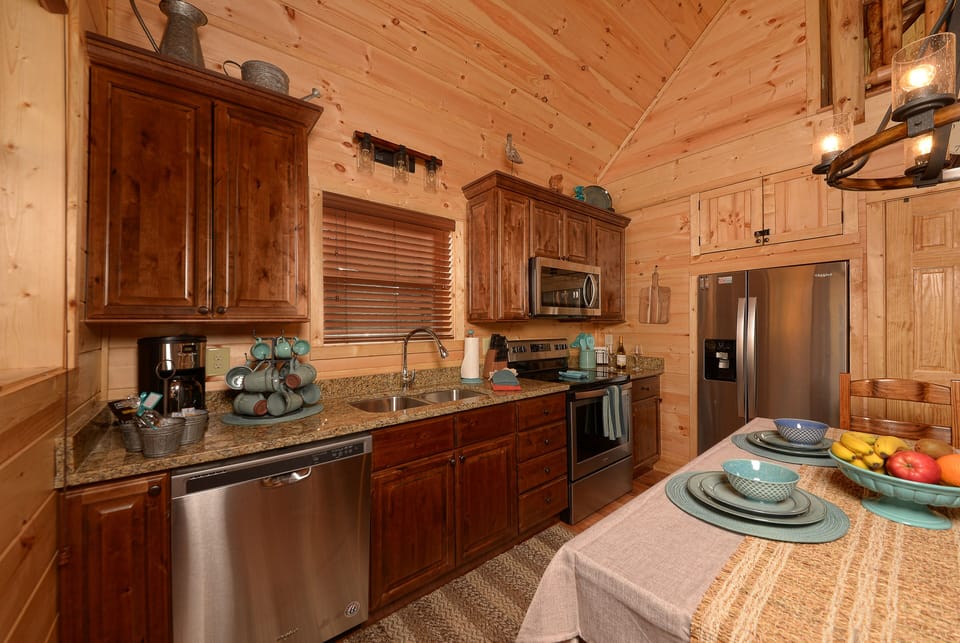 The stone dinnerware matches the teal accent decor and there is setting for 8.