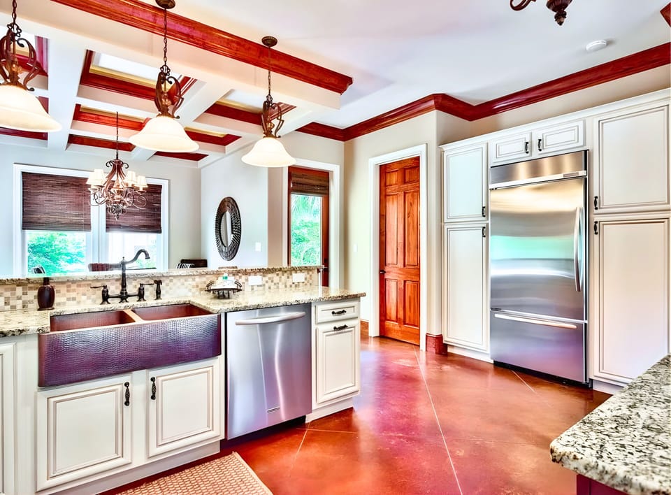 1st Floor - 🍽️ Gourmet Kitchen: Granite counters, premium appliances, and custom copper sinks