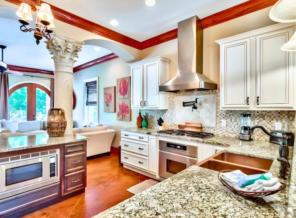 🍽️ Gourmet Kitchen: Granite counters, premium appliances, and custom copper sinks