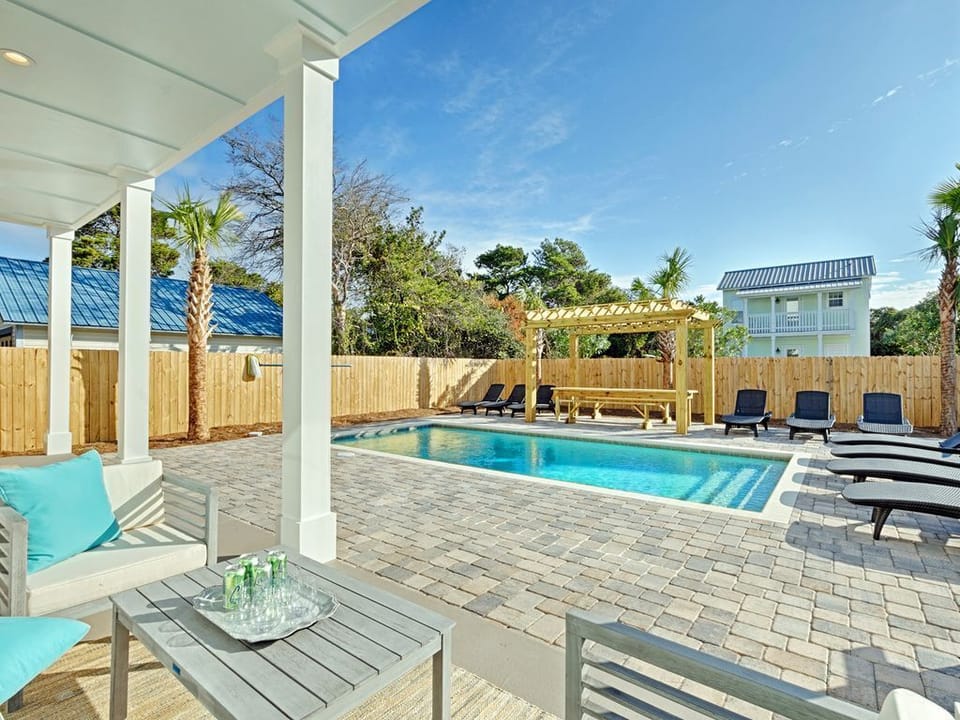 Seating by the Saltwater Pool with the Gas BBQ Grill