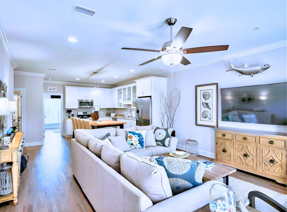 Spacious Living room  with sectional sofa and flat-screen TV