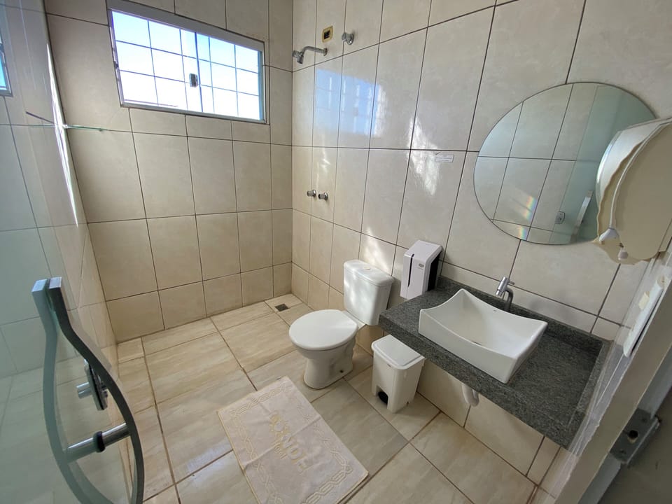 Shower, towels, soap, toilet paper