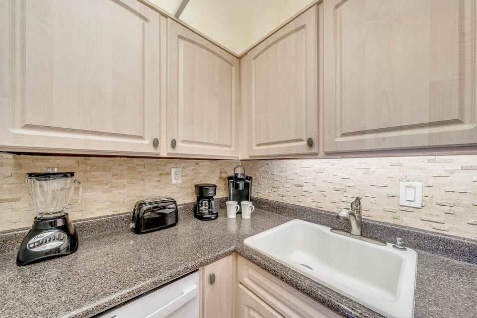 Functional kitchen with granite countertop