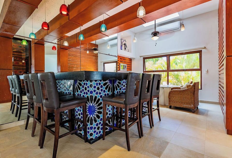 Second kitchen with  a wet bar