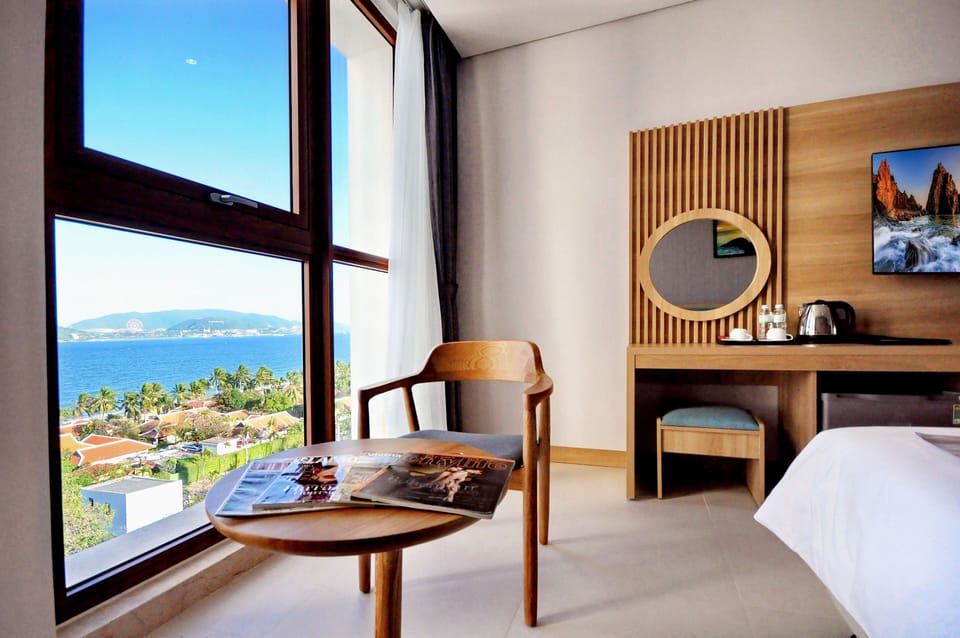 Senior Twin Room, Sea View | Minibar, in-room safe, desk, blackout drapes