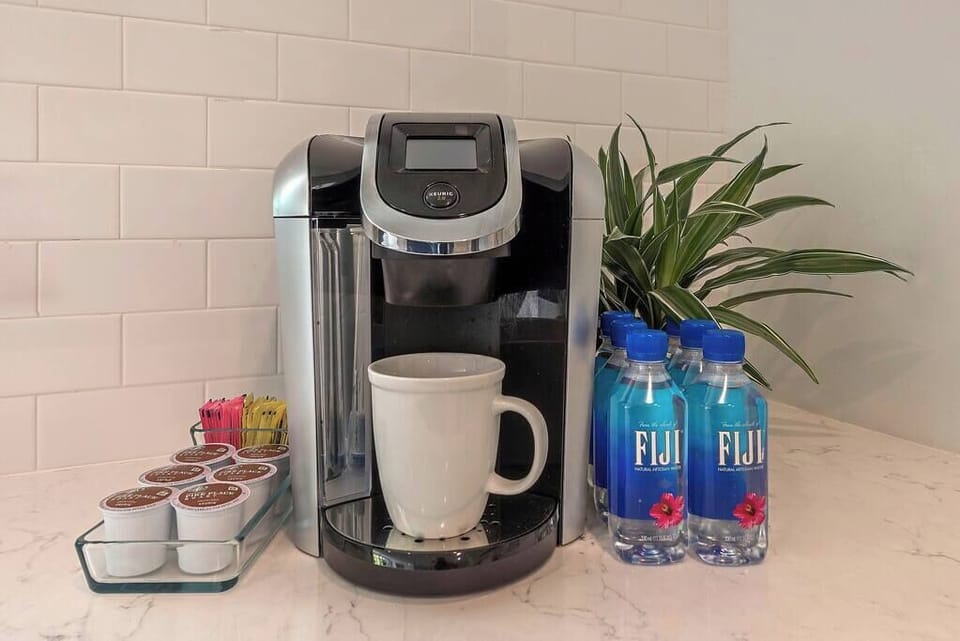 Complimentary starter kit of Keurig Starbucks K-cups, creamer, sugar & bottled water (brand to vary) to take to the beach