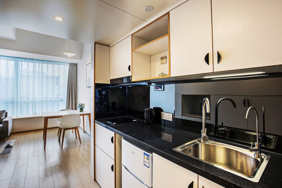 Mini-fridge, microwave, dining table