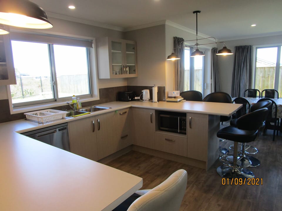 Large kitchen with lots of bench space.