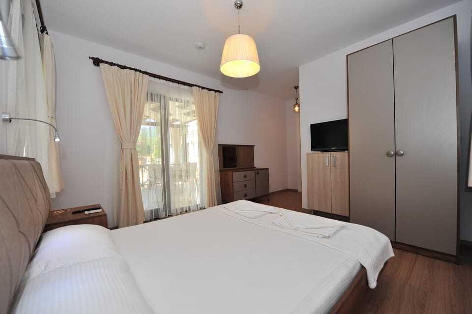 Deluxe Double Room, Terrace, Pool View | Premium bedding, in-room safe, individually decorated