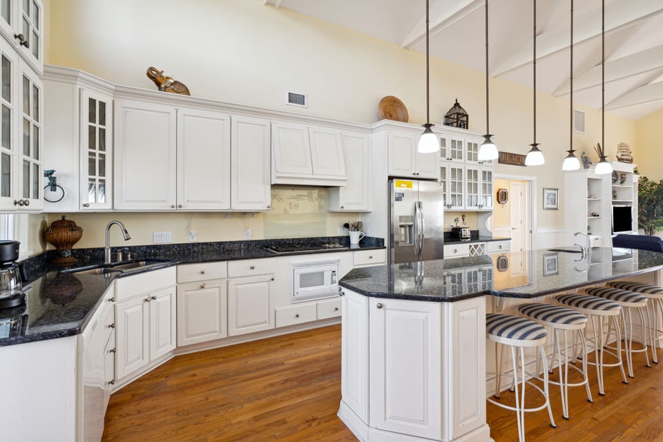 Another view of the spacious kitchen with bar seating for 5