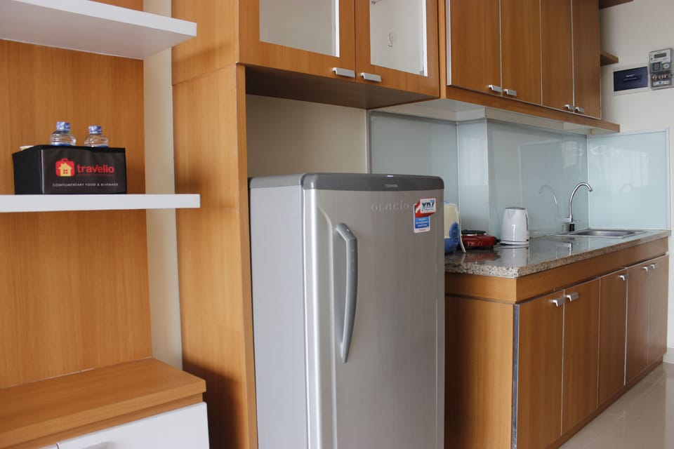 Room | Private kitchen | Fridge, stovetop, electric kettle, cookware/dishes/utensils