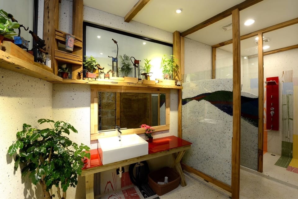 Family Room | Bathroom | Shower, hair dryer, slippers, towels
