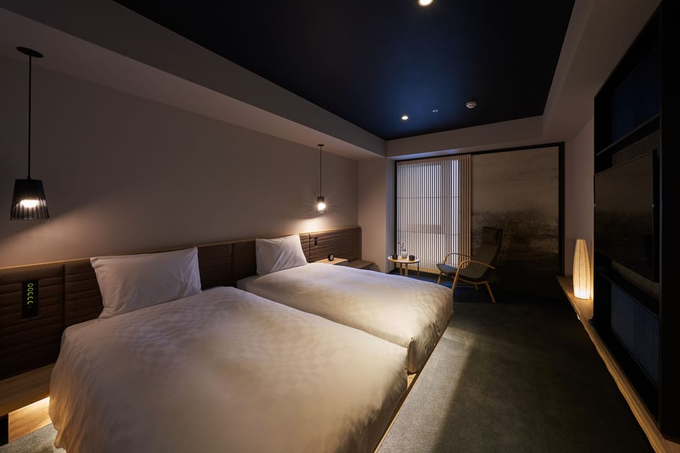 Deluxe Twin Room Non Smoking | Down comforters, in-room safe, blackout drapes, iron/ironing board
